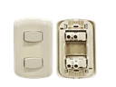 INTERRUPTOR APAGADOR DOBLE OVALADO 15AMP CREMA UNID V-TEG